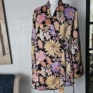 Black Floral Wrap Romper Shorts with Pastel Blooms